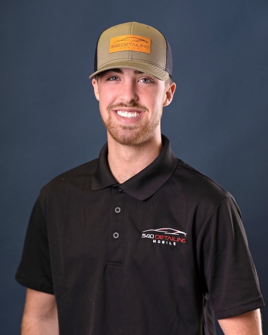 Alex Metz, owner of 540 Detailing, in a 540 Detailing polo and cap