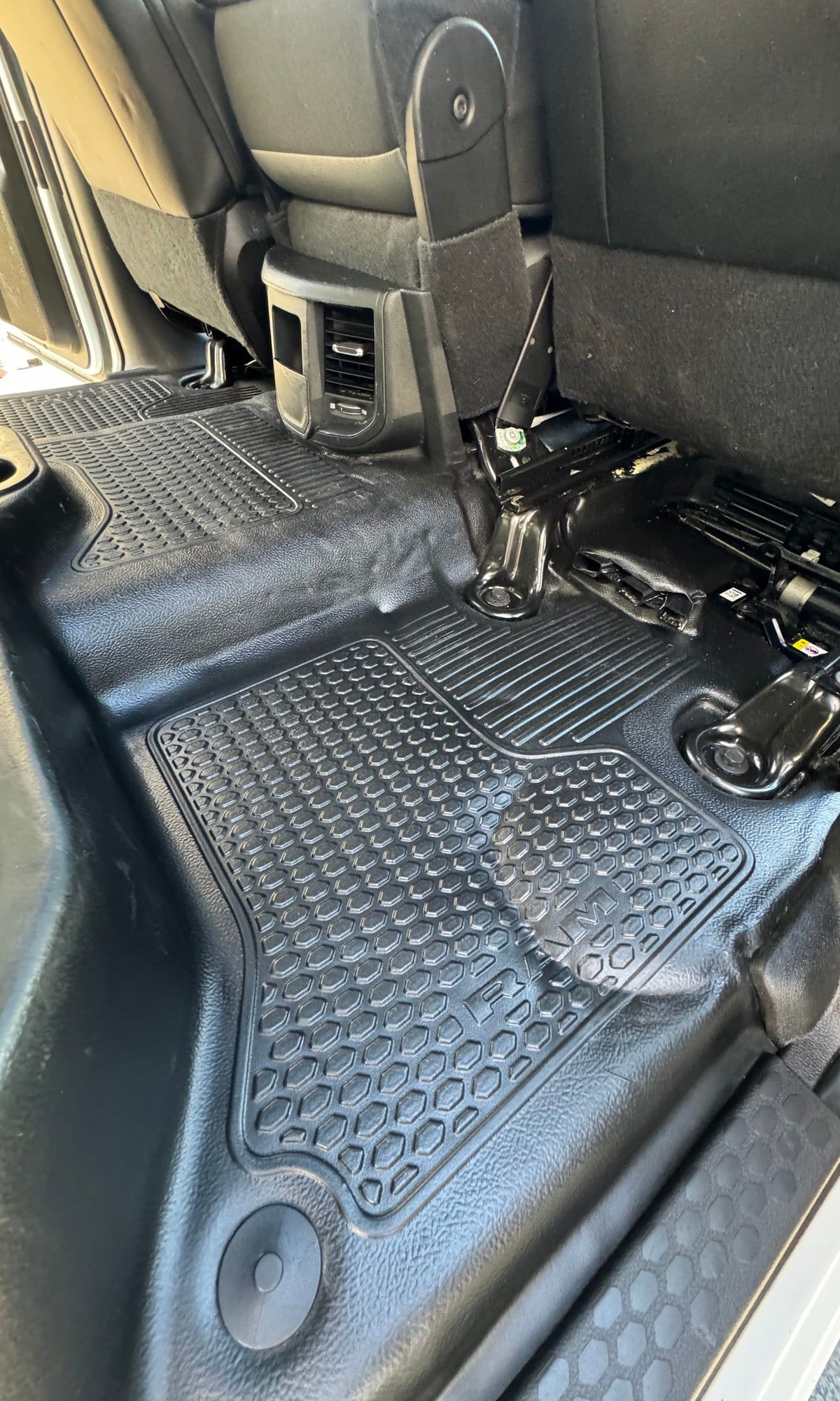 After: the same truck floor cleaned, with spotless rubber floor mats