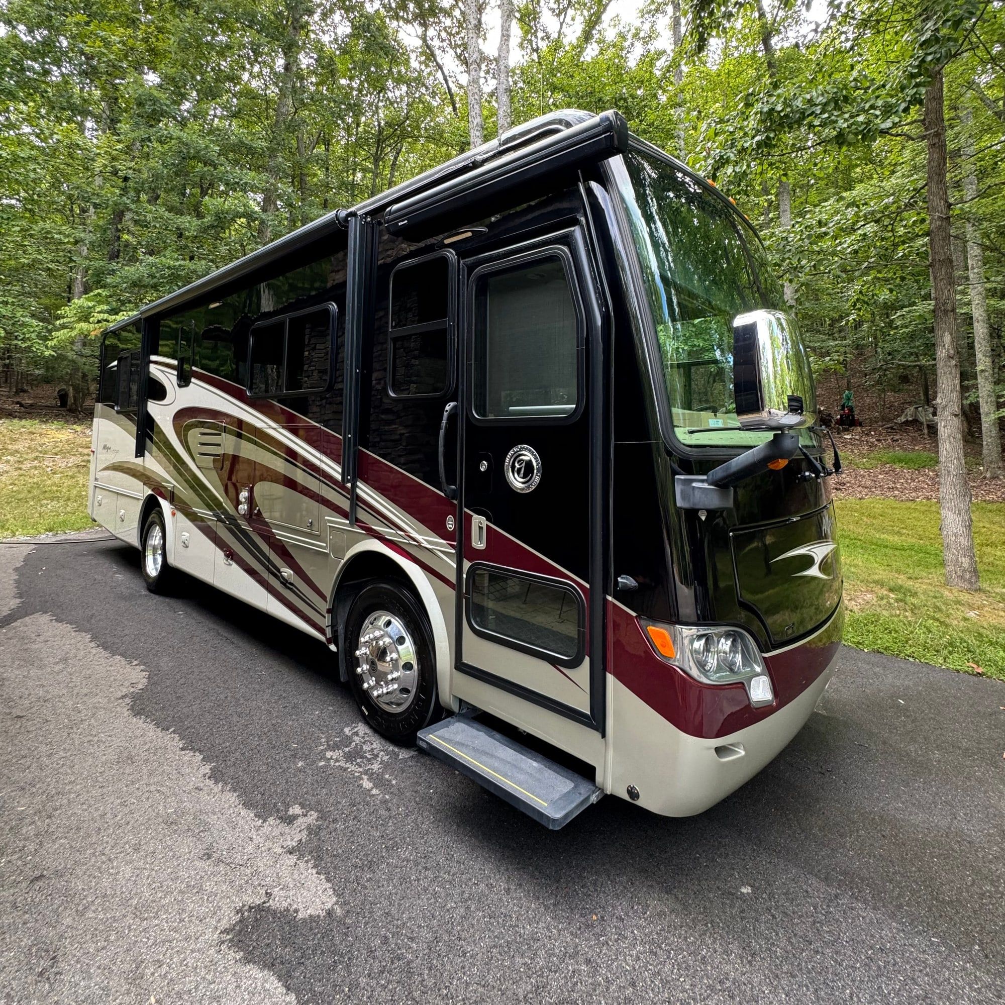 Detailed Class A motorhome parked in a driveway
